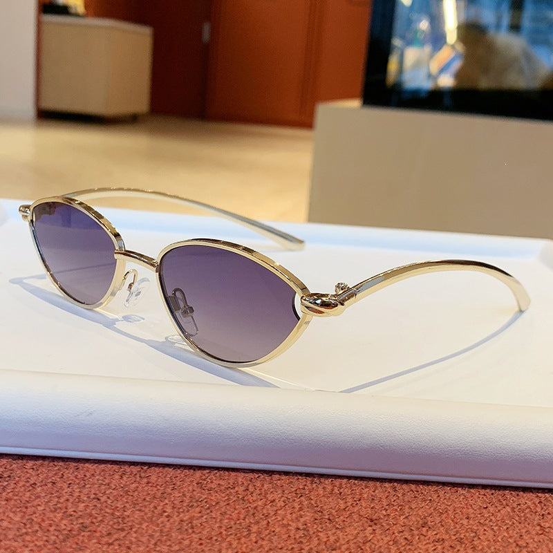 Women's Designer Sunglasses with Elegant Metal Frame and Protective Lenses Skanto