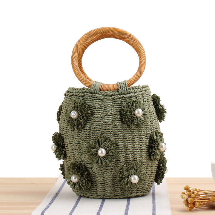 Handbag with unique pearl embellishments Skanto