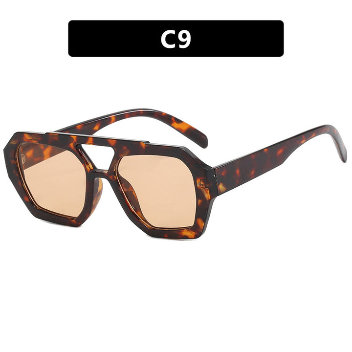 Dame oversized solbrille i markant, åttkantet design Skanto