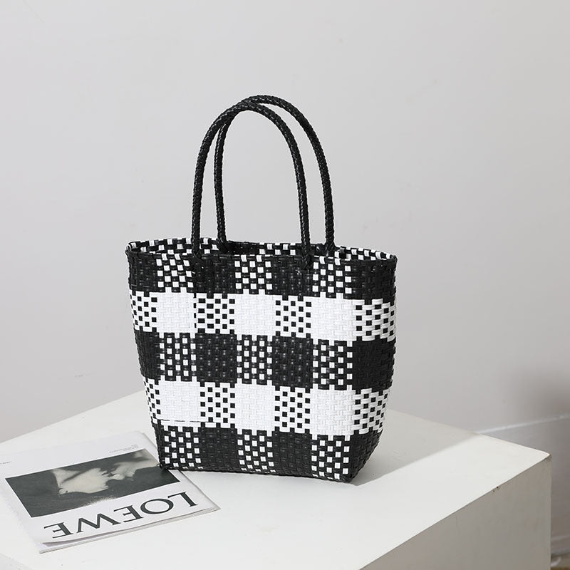 Handmade basket bag in modern plaid pattern Skanto