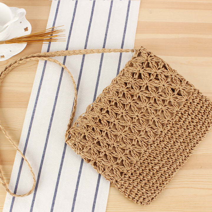 Hand-knotted shoulder bag with floral details Skanto