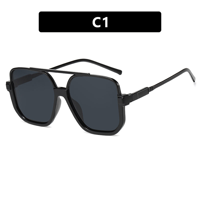 Women's square sunglasses with transparent frame and green tinted lenses Skanto