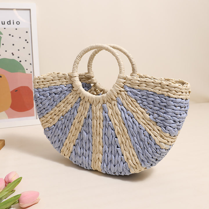 Handbag made of hand-woven raffia with structured base Skanto