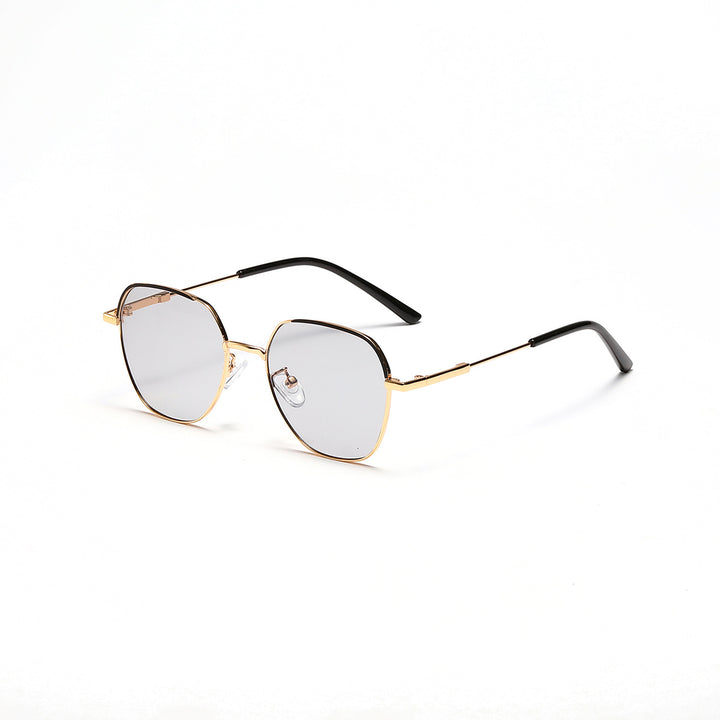 Dame moteriktig solbrille med smal metallramme og blå linser Skanto