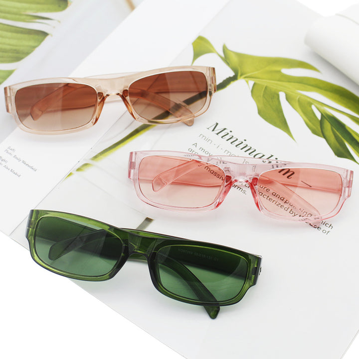 Dame moteriktig solbrille i stilrent rektangulært design Skanto