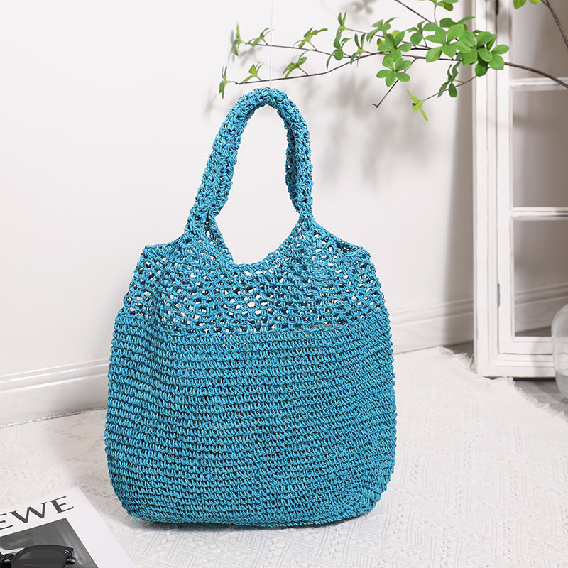 Hand-knotted raffia bag with long carrying handles Skanto