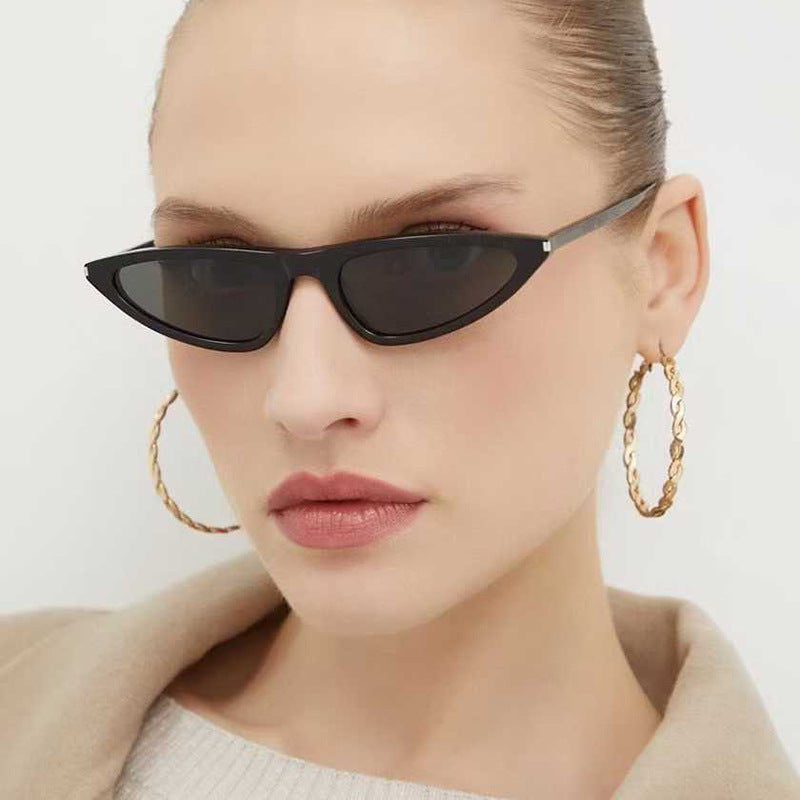 Dame Cat-Eye solbriller med elegant plastikkramme og UV-beskyttelse Skanto