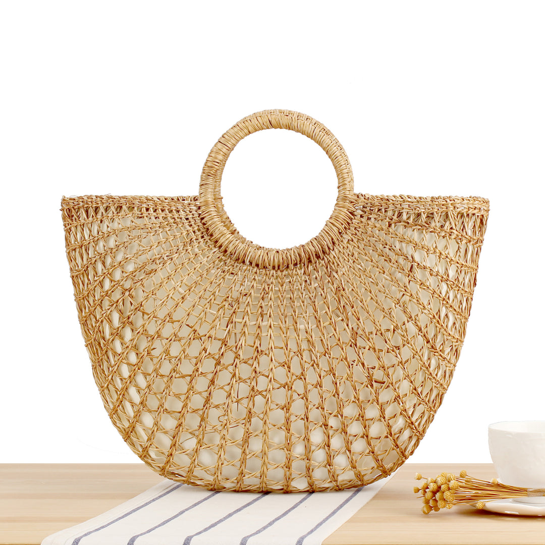 Basket bag with elegant round handle and handmade design Skanto