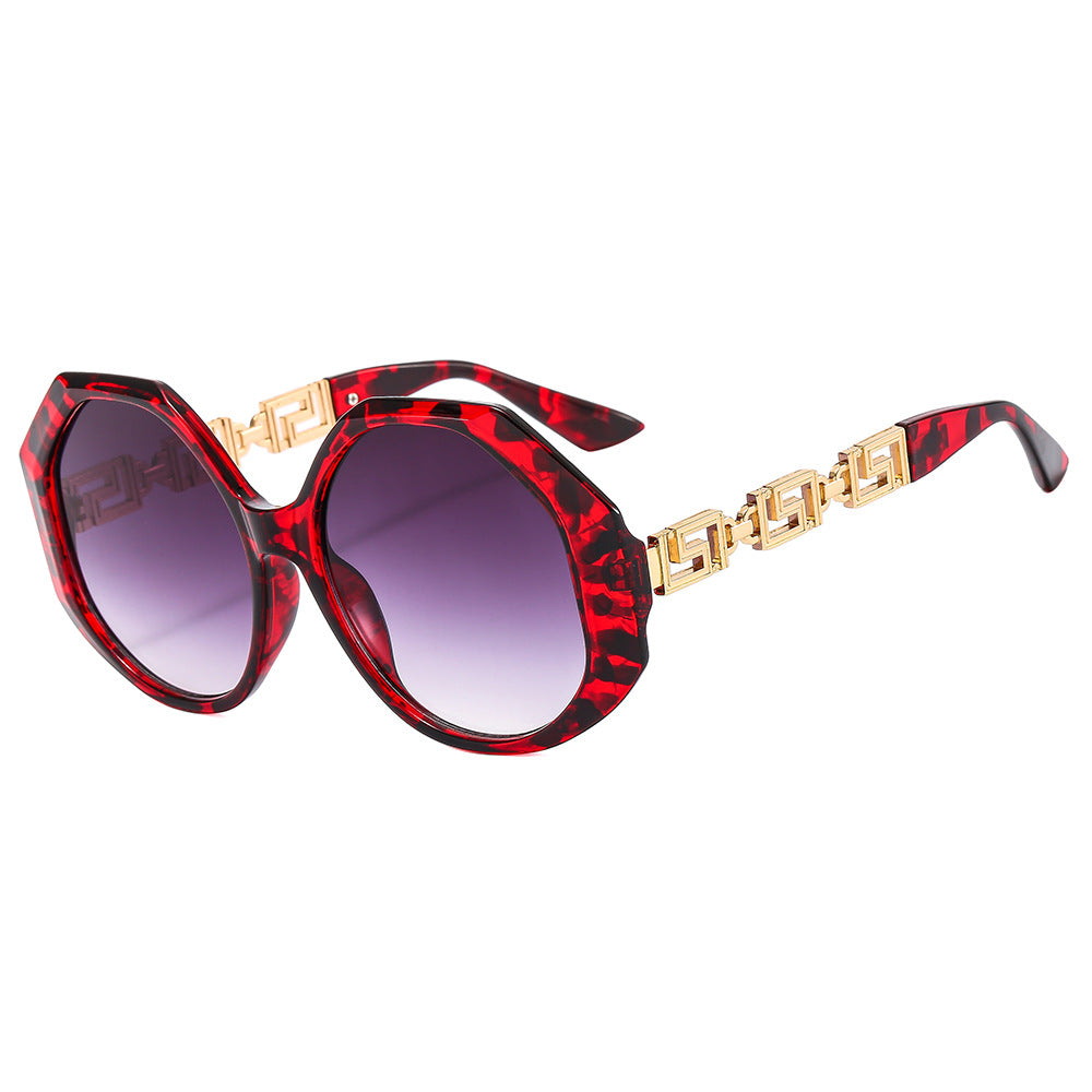 Dame oversized solbrille med iøynefallende oktagonal design Skanto