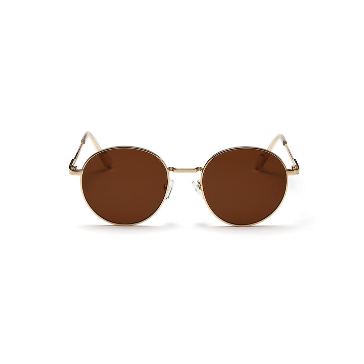 Dame rund solbrille med luksuriøs metallramme og UV-beskyttelse Skanto