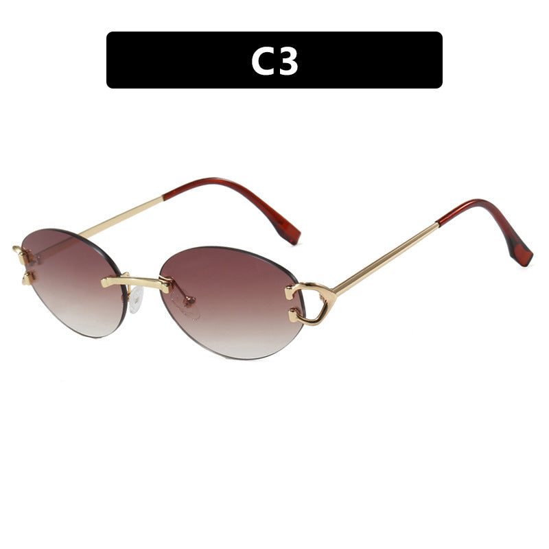 Women's elegant oval sunglasses with modern metal frame Skanto