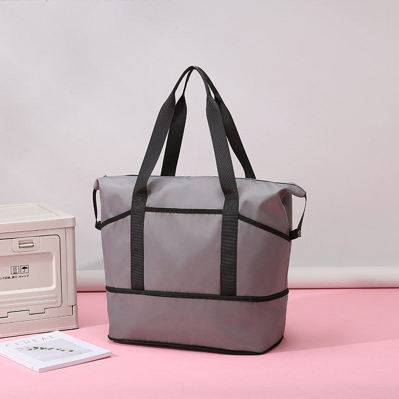 Romslig og funksjonell handlebag Skanto