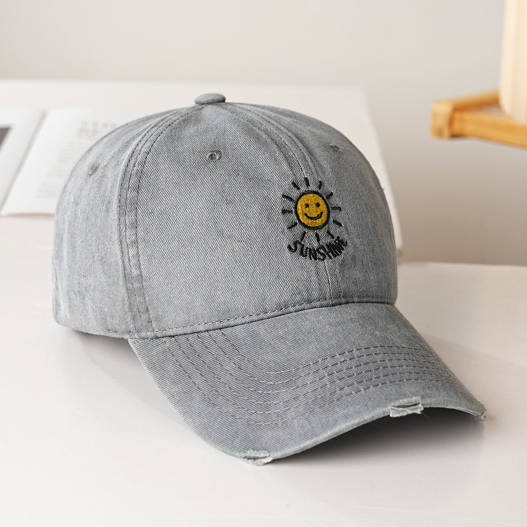 Dame sporty bomullslue med solbroderi Skanto