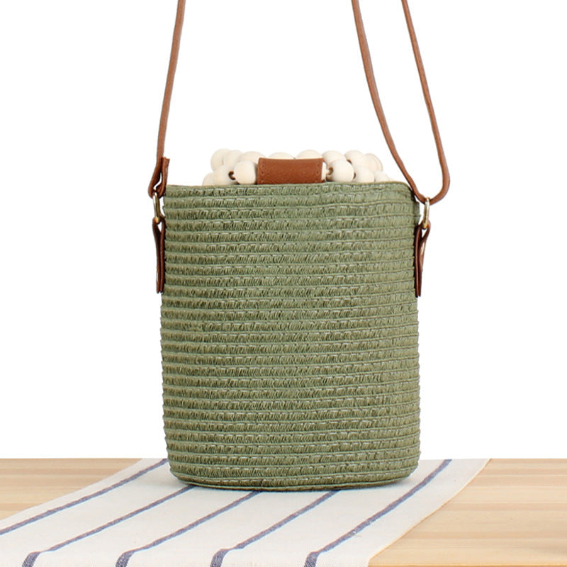 Handbag made of high-quality woven natural material with innovative lock Skanto