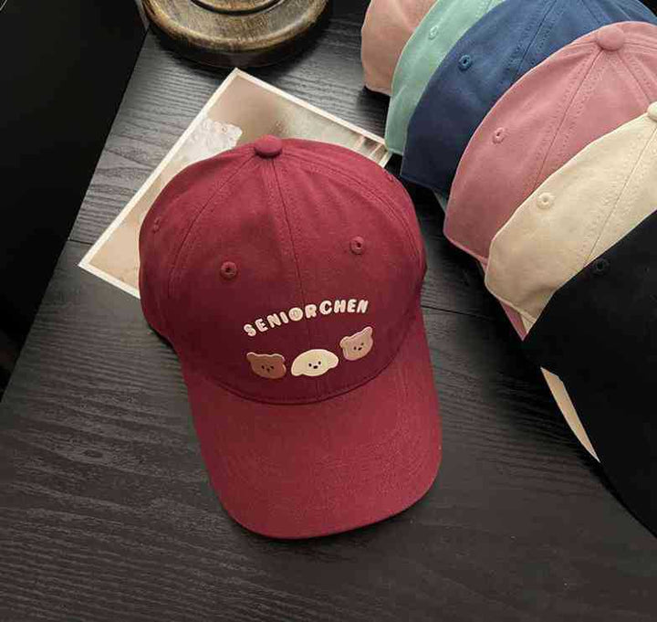 Kvinne leken grafisk caps Skanto