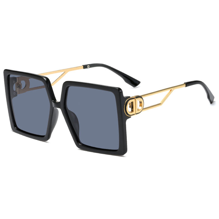 Dame oversized firkantet solbrille med elegant metallramme og polariserte glass Skanto