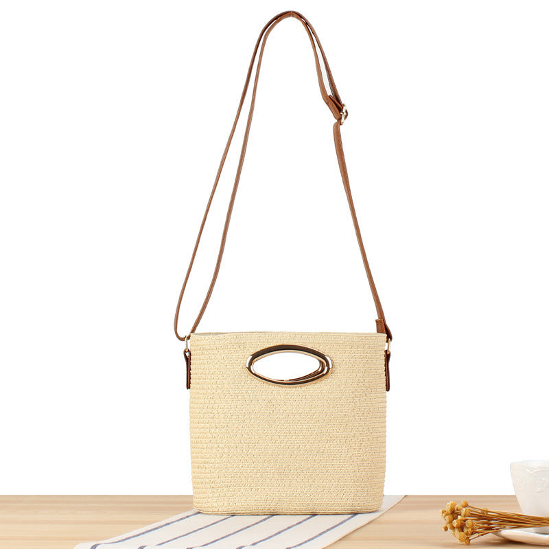 Handwoven natural material crossbody bag with elegant ring clasp Skanto
