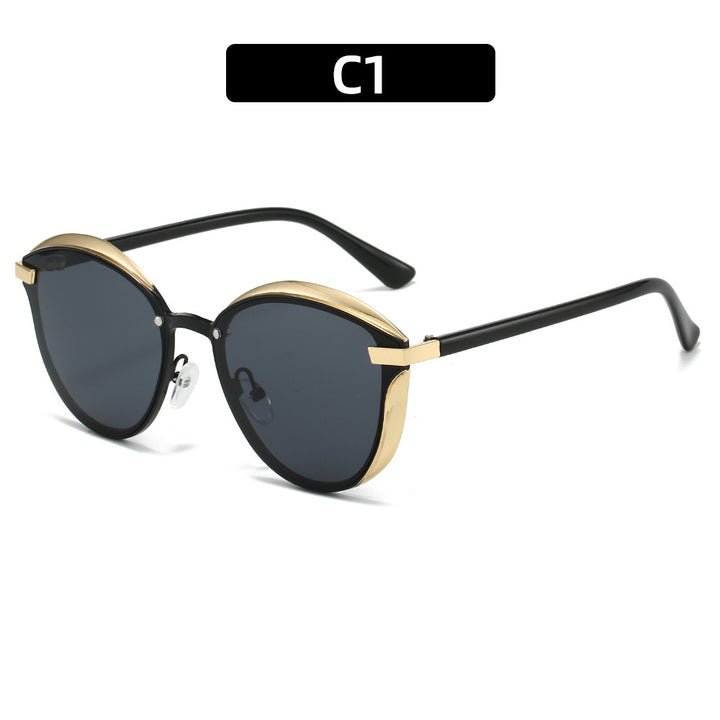 Dame solbrille med luksuriøs metallramme og harmonisk kontur Skanto