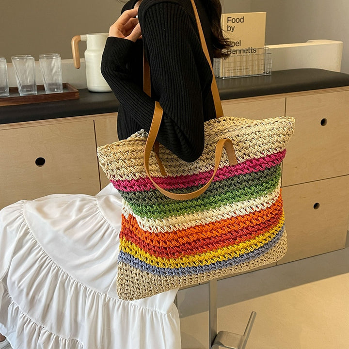 Håndlaget strandveske med fargerikt stripe mønster Skanto