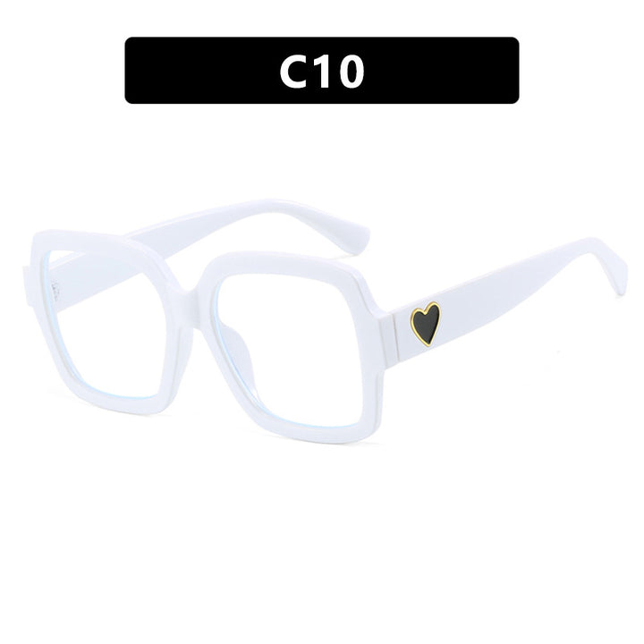 Dame firkantet solbrille med leken hjerte detalj Skanto