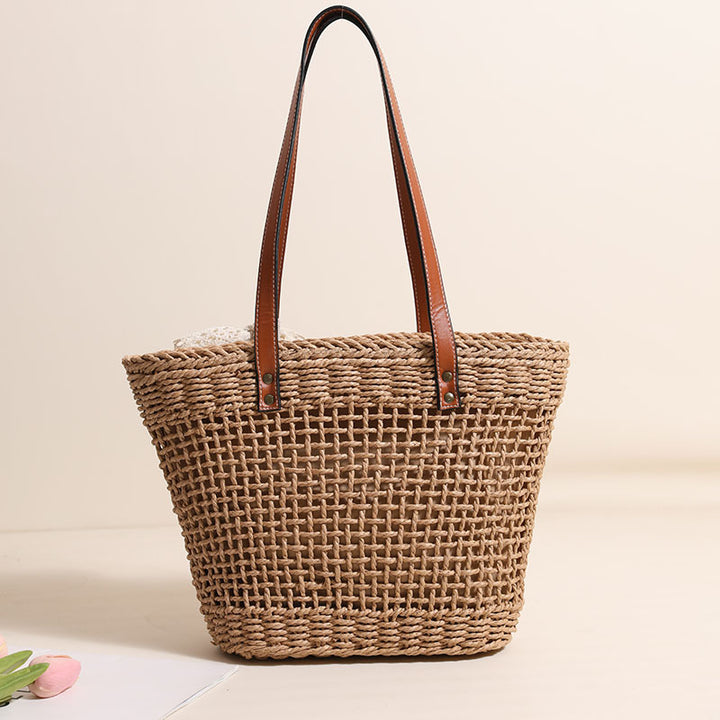 Handmade straw bag with elegant leather accents Skanto