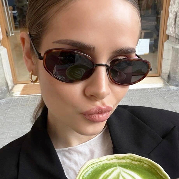 Women's elegant round sunglasses with modern metal frame Skanto