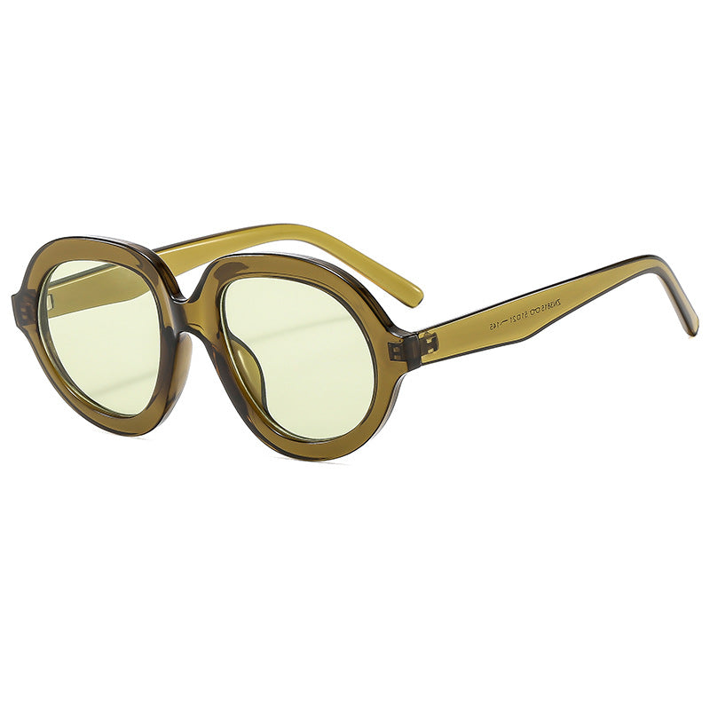 Dame trendy solbriller med bred, oval ramme Skanto
