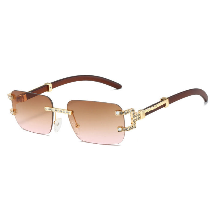 Dame designer solbrille med unik smykkedetalj Skanto