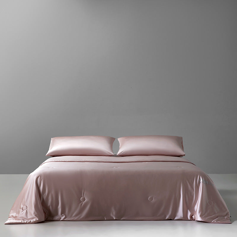 Damer Luksuriøs Satin Dyne med elegant knappestruktur Skanto