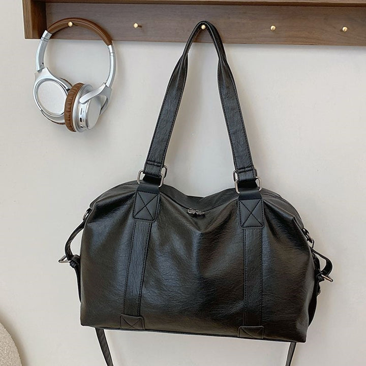 Mangfoldig crossbody-veske Skanto