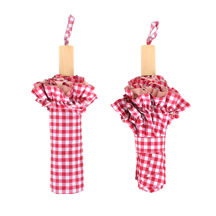 Kvinne solbeskyttelsesparaply Skanto