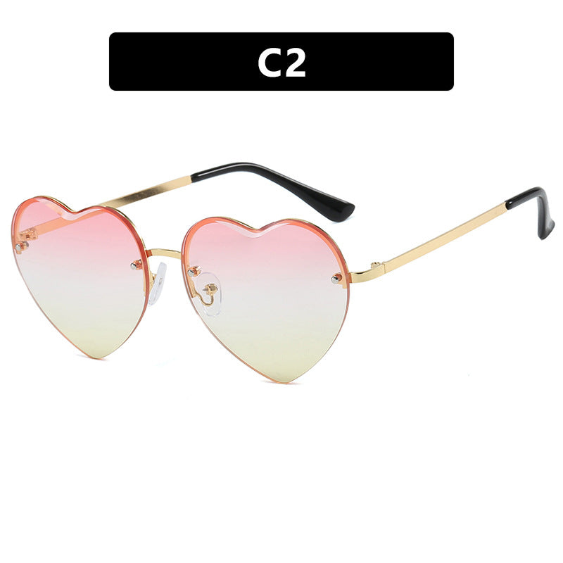 Women's heart-shaped sunglasses with mirrored lenses and modern metal frame Skanto