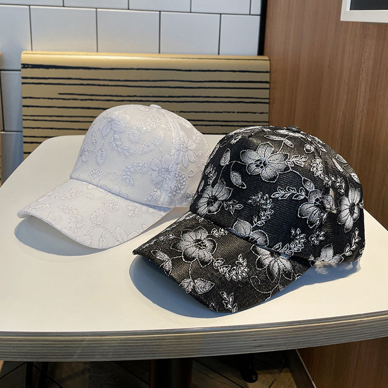 Kvinnens blomsterbroderte baseballcap Skanto