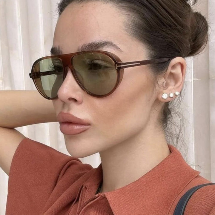 Women's stylish sunglasses in aerodynamic design Skanto