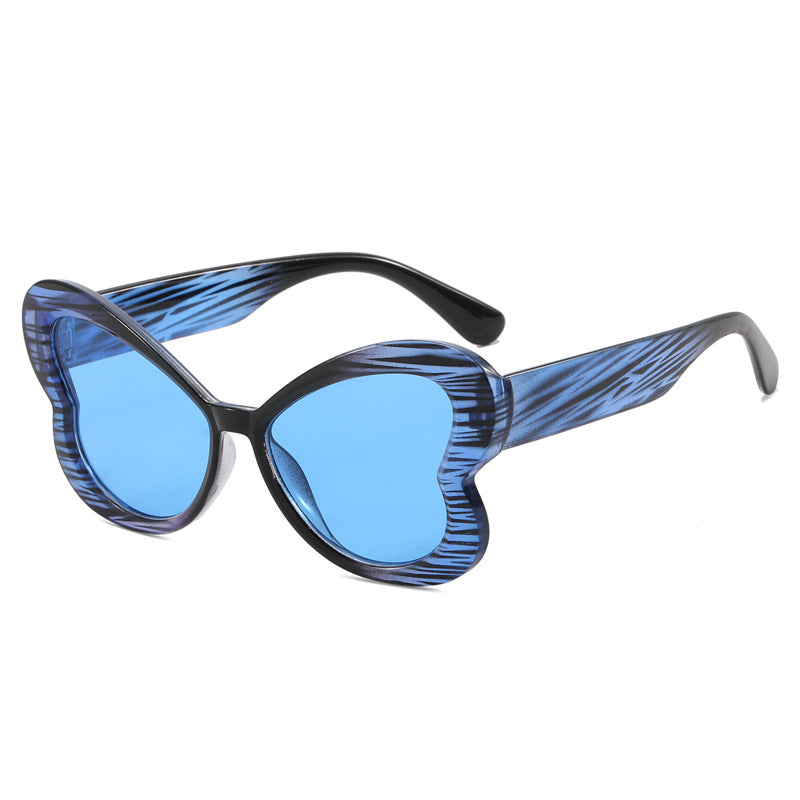 Dame Oversized-solbrille i leken sommerfugl-design Skanto