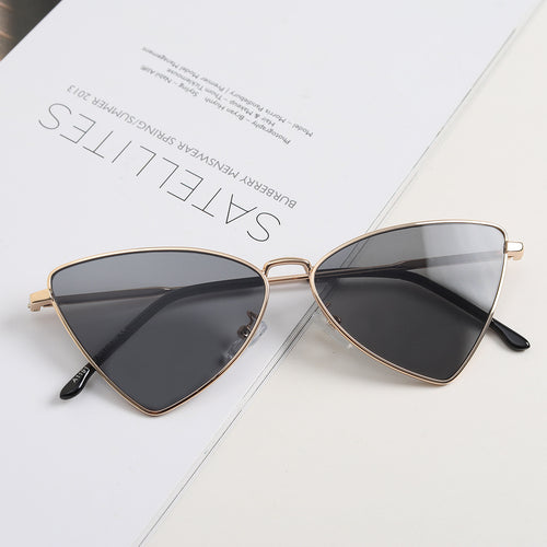 Dame trendy Cat-Eye solbriller med gullige detaljer Skanto