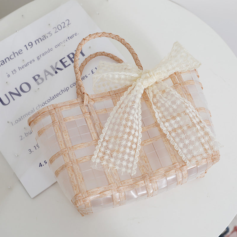 Handmade basket bag with elegant bow application Skanto