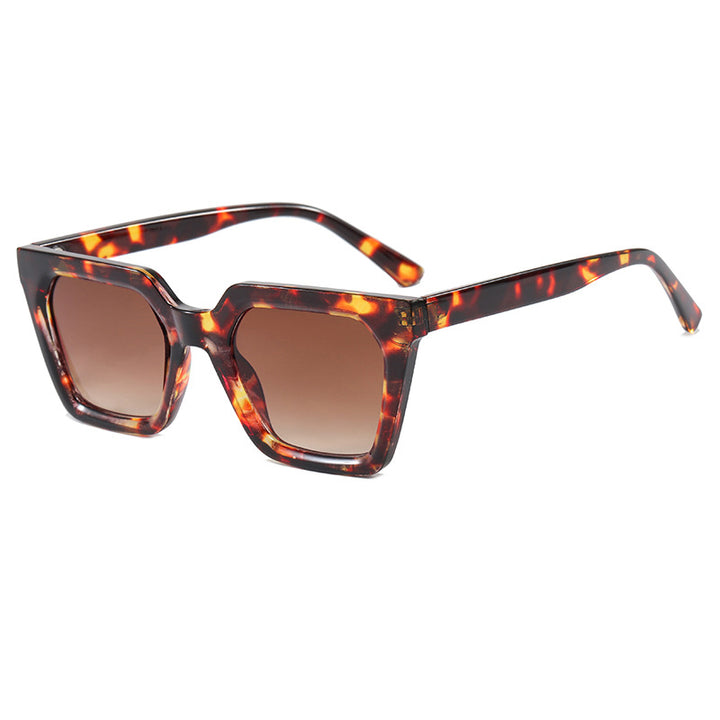 Dame moderne designer-solbrille med transparent ramme Skanto