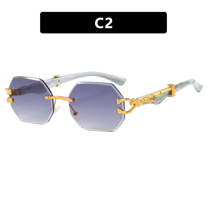 Women's fashionable sunglasses with extravagant octagonal design and gold accents Skanto
