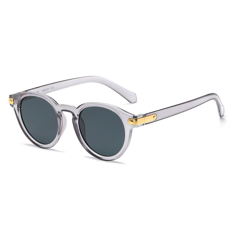 Dame moteriktig solbrille med transparent ramme og robuste glass Skanto