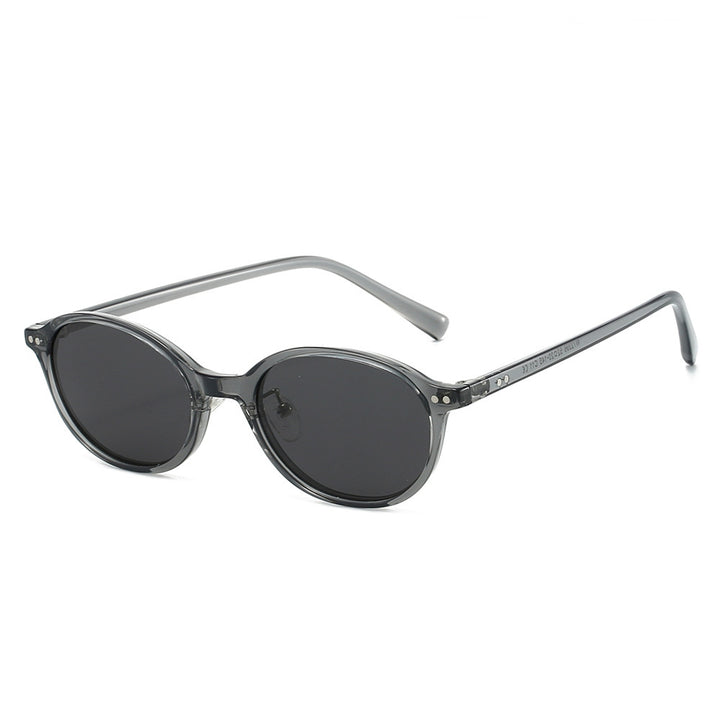 Dame Premium solbrille i elegant oval design Skanto