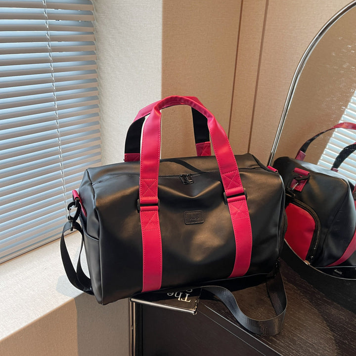 Sporty duffel bag with durable water-repellent material and versatile carrying options Skanto