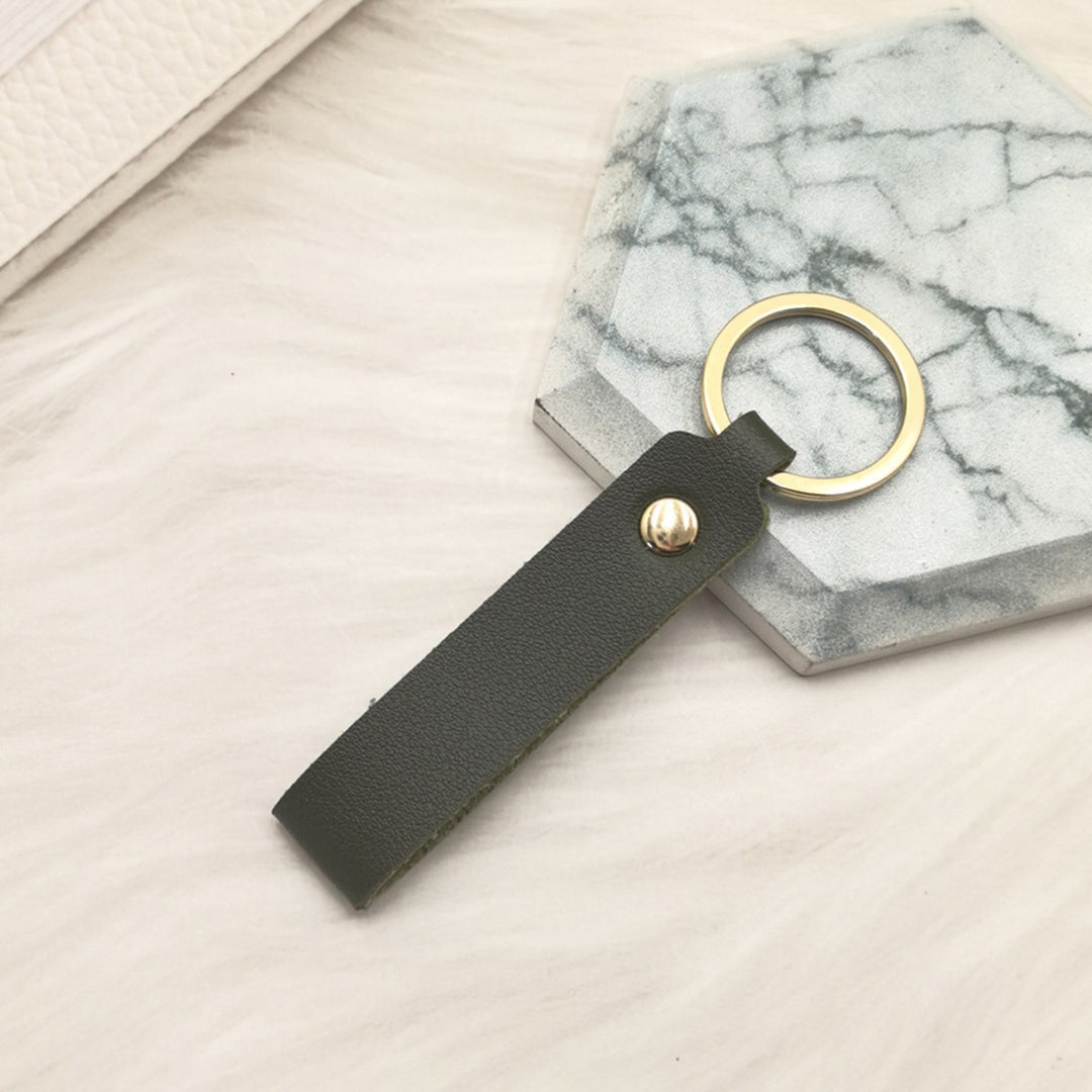 Unisex nøkkelring laget av høykvalitets kunstskinn med elegant metalldekor Skanto