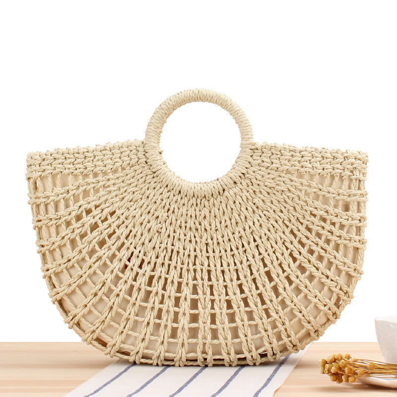 Handbag made of handmade weave with elegant round handle Skanto