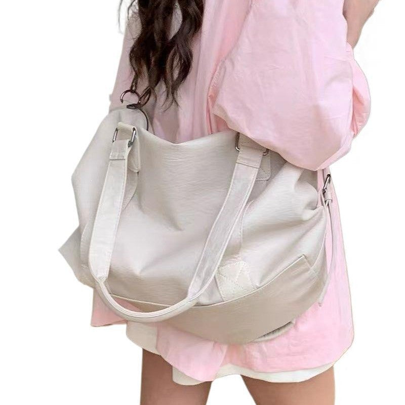 Mangfoldig crossbody-veske Skanto