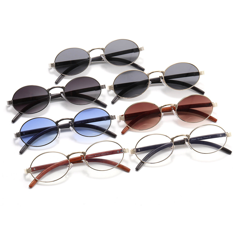 Dame rund designer solbrille med innovativ metallramme Skanto