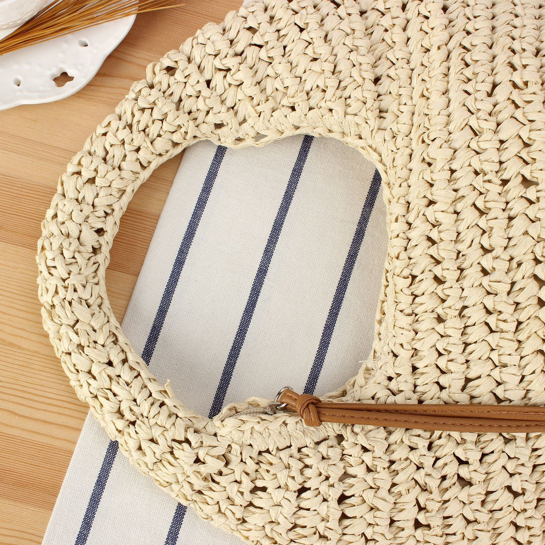 Hand-knotted shoulder bag in natural material Skanto