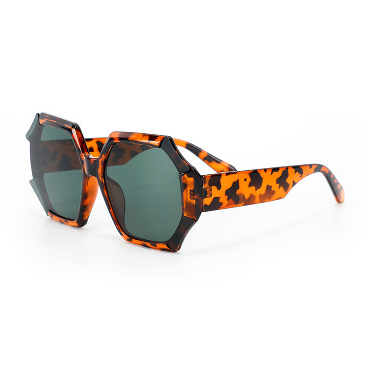 Dame moterelatert solbrille med fasettert ramme Skanto