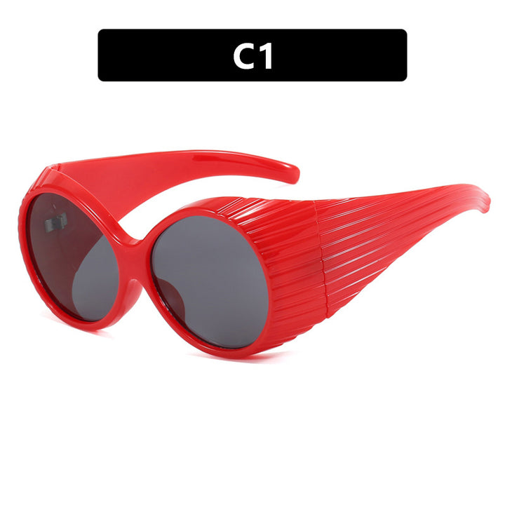 Women's extravagant sunglasses with curved frame Skanto