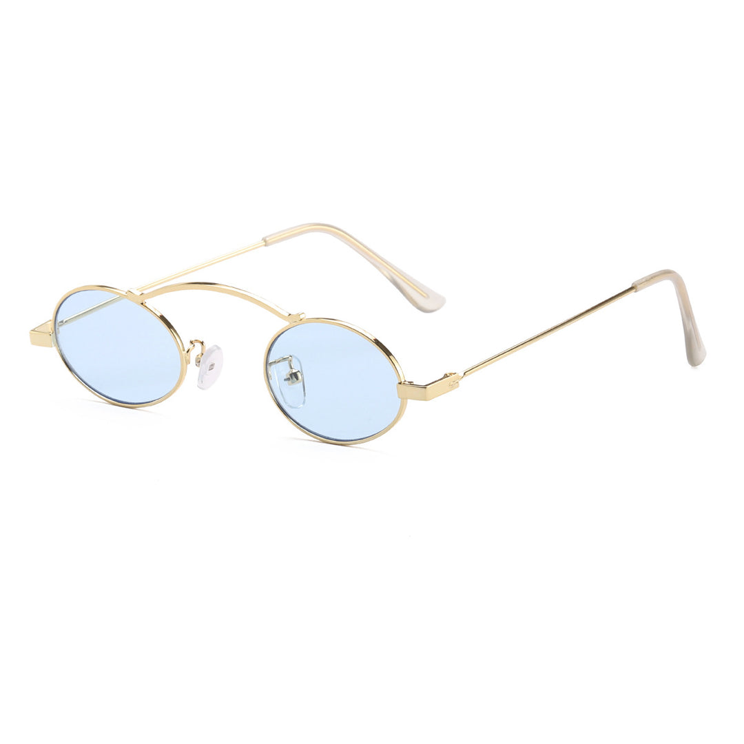 Dame moteriktig solbrille med unike sirkulære rammer og karakteristiske linser Skanto